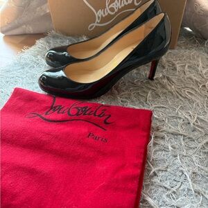 Christian Louboutin Black Patent Pumps with Red Soles